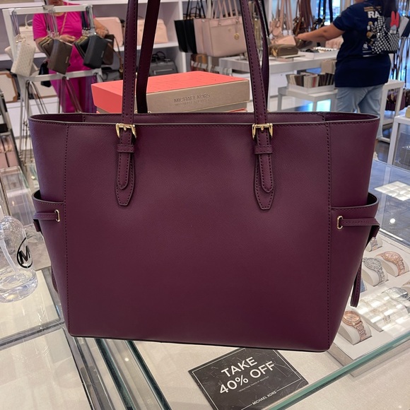 Michael Kors Gilly Large Drawstring Travel Leather Top Zip Tote 
Oxblood Color - Picture 10 of 16